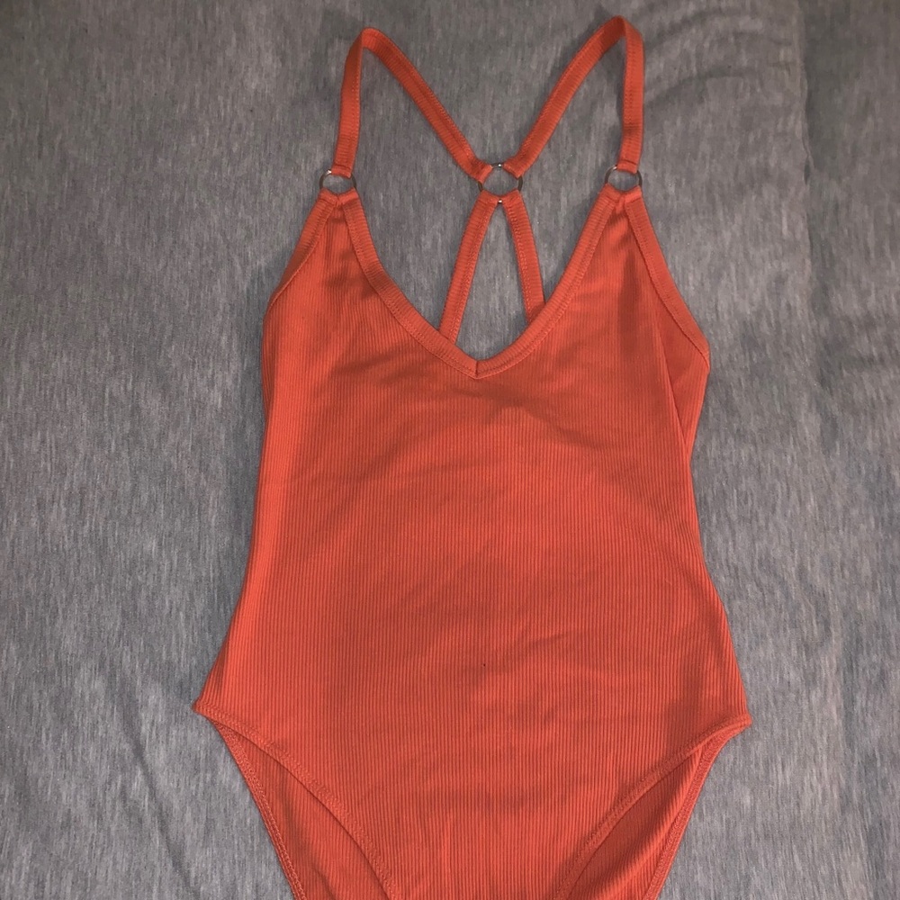 Orange bodysuit